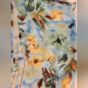 Crepe lightweight mulri-color abstract flowers fabric.